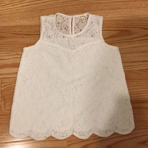 a white lace tank top